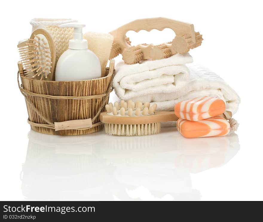 Accessories for bathing
wooden bucket, hairbrush, massager
white plastical bottle with spray
soap
white cotton towels
all its iolated on white background with reflection on white background. Accessories for bathing
wooden bucket, hairbrush, massager
white plastical bottle with spray
soap
white cotton towels
all its iolated on white background with reflection on white background