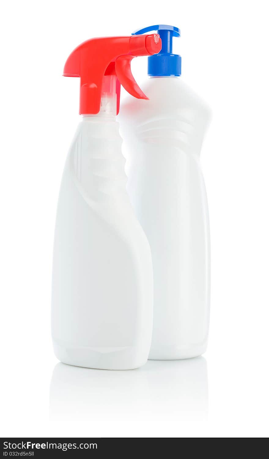 Two white plastical kitchen cleaners
with red and blue sprays isolated on white background. Two white plastical kitchen cleaners
with red and blue sprays isolated on white background