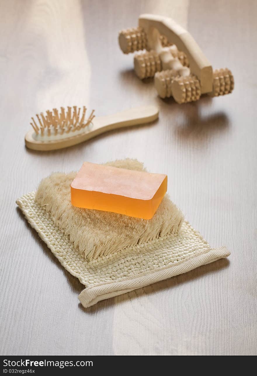 Set of articles for bath
wooden hairbrush, massager
natural bast
orange hanmade soap
on wooden background. Set of articles for bath
wooden hairbrush, massager
natural bast
orange hanmade soap
on wooden background