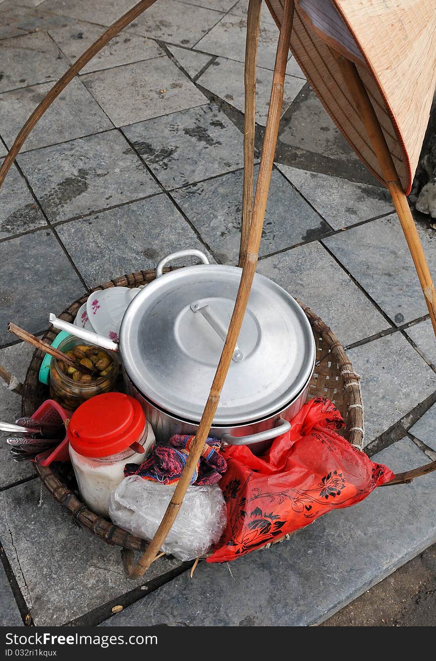 Food utensils in a basket at the streets of Hanoi in Vietnam