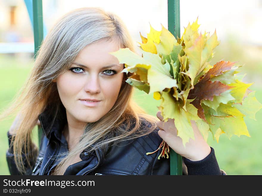 Young beautiful woman with the nature, autumn. Young beautiful woman with the nature, autumn.