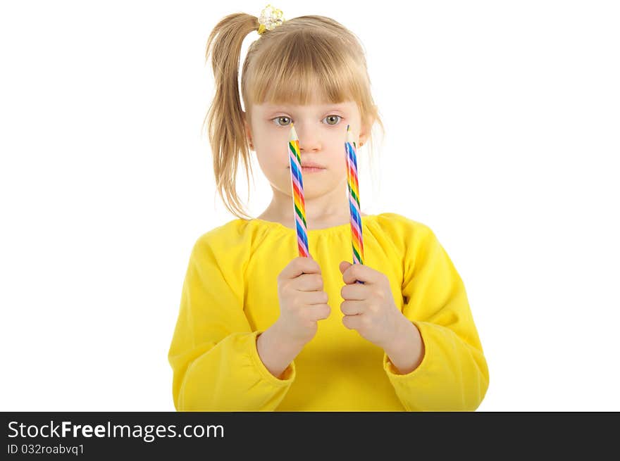 Little girl with colour pencils isolated on the white