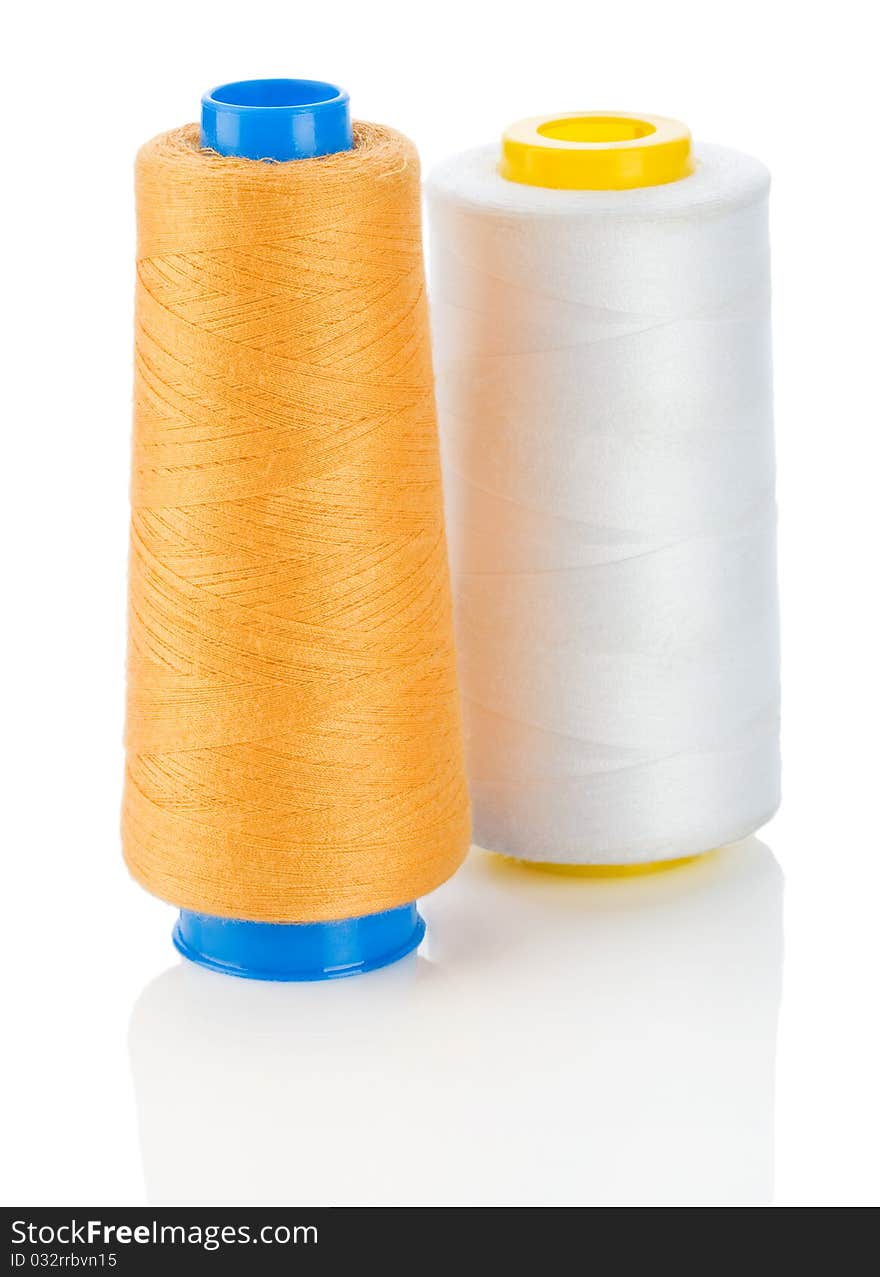 Orange And White Thread On Spools Isolated