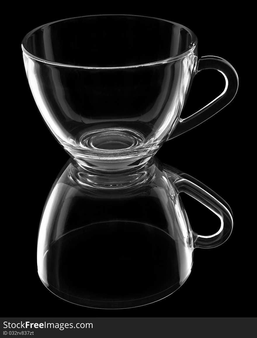 Transparent cup with reflection isolated on black