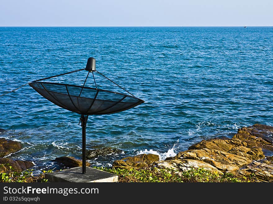 Satellite dish at the seashore