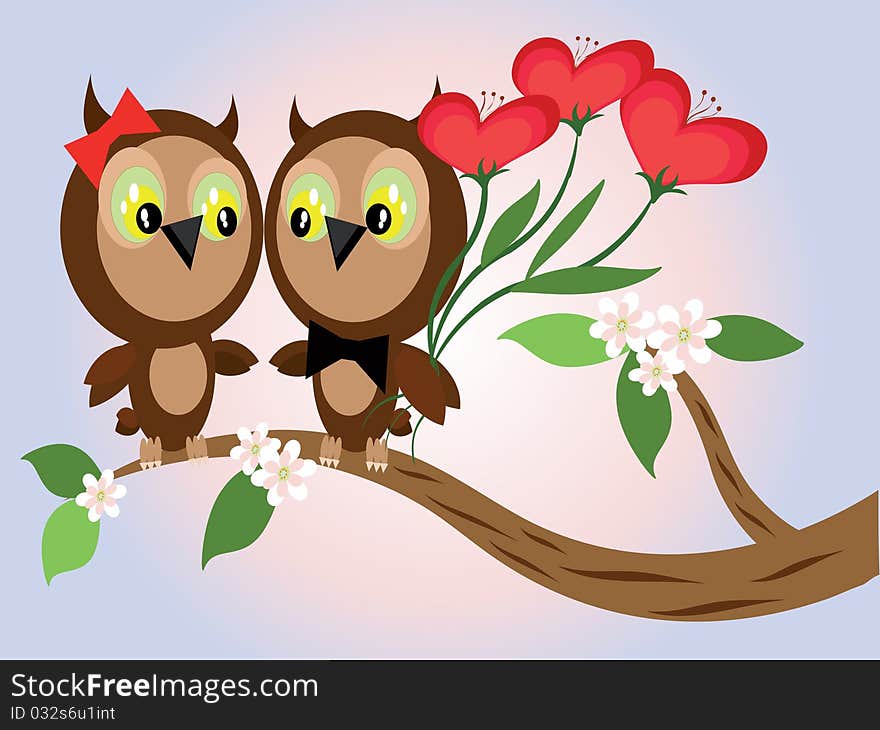 Couple of owls sitting at the branch of cherry. Couple of owls sitting at the branch of cherry