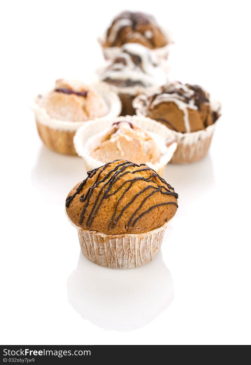 Composition of tasty cakes isolated on white background