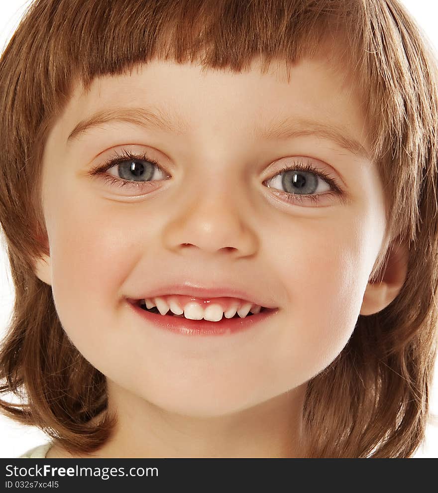 Happy little girl portrait close up isolated on white