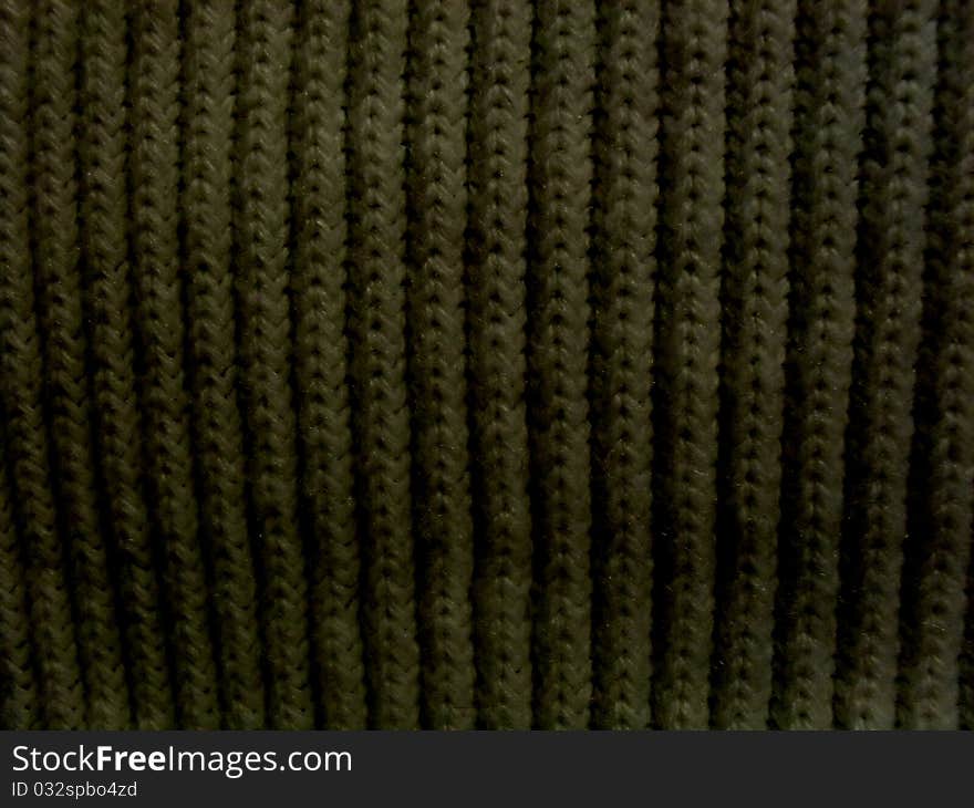 Gray knit pattern material background texture closeup. Gray knit pattern material background texture closeup