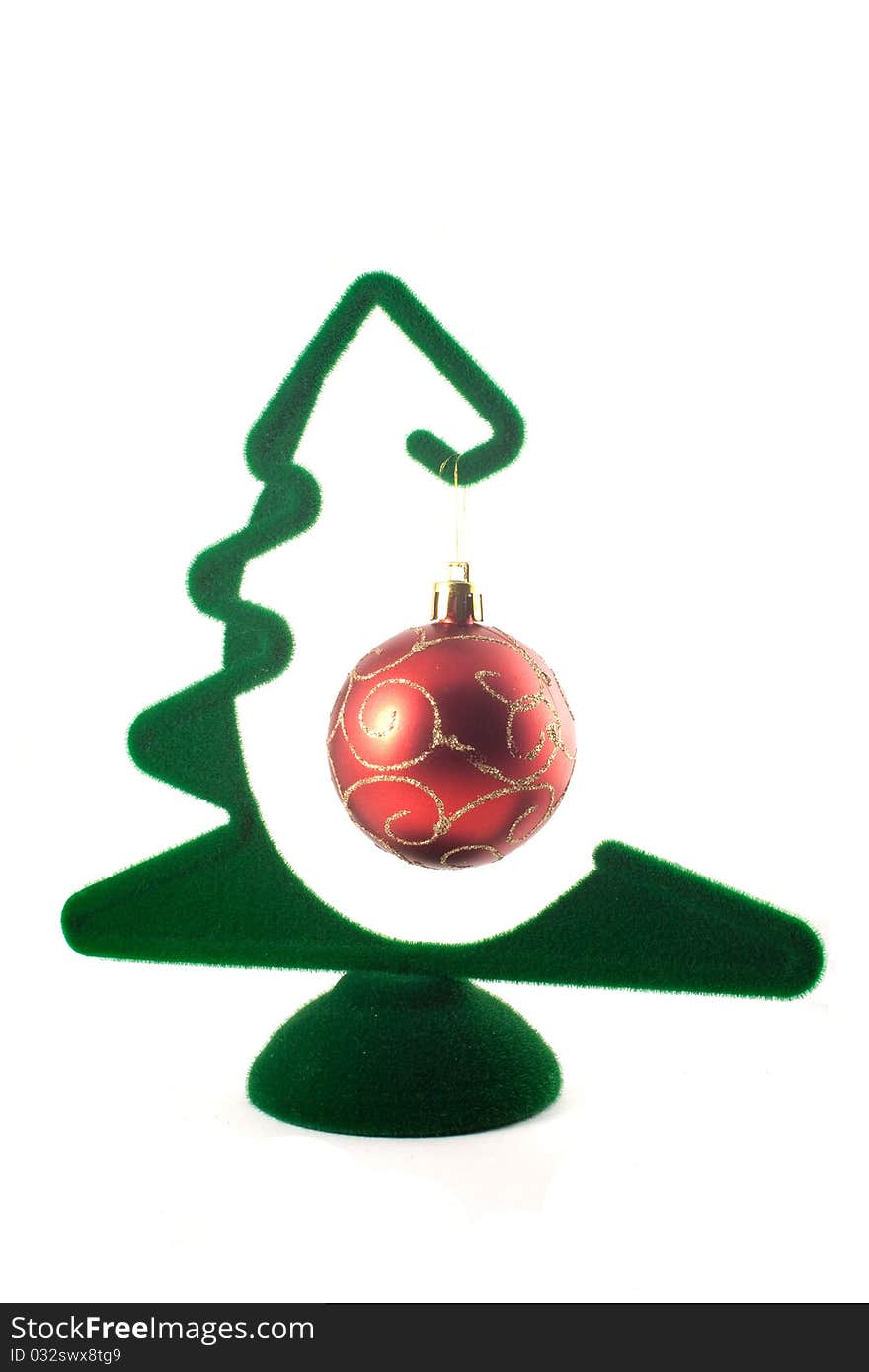 Green christmas tree. Red ball