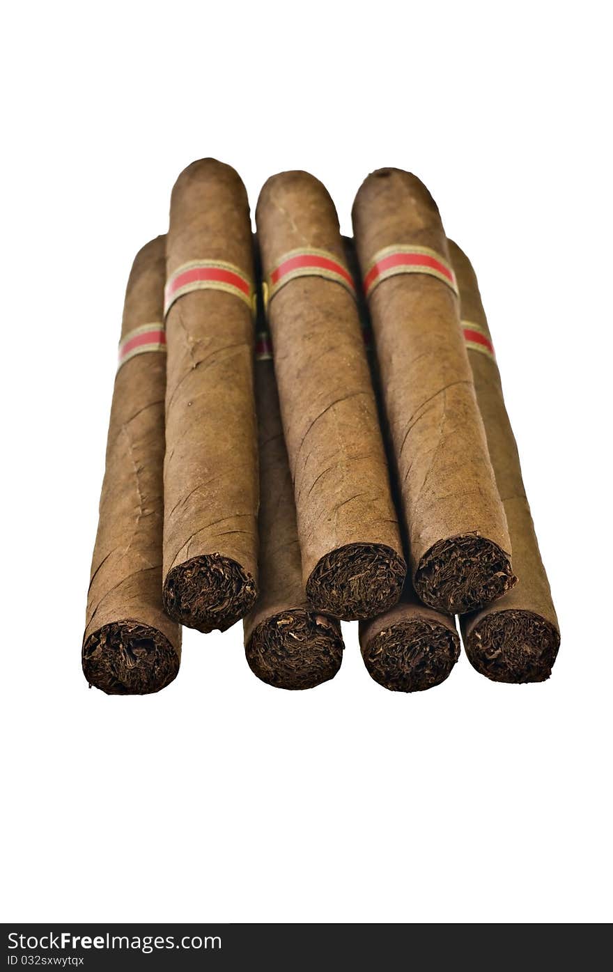 7 corona cigars isolated on white background. 7 corona cigars isolated on white background.