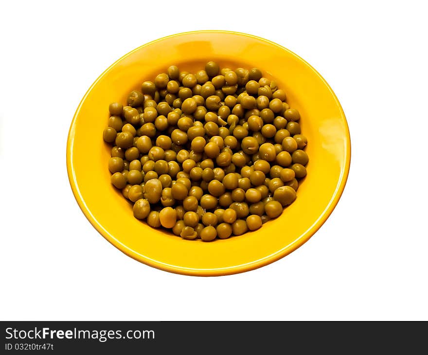 Canned green peas in a yellow plate