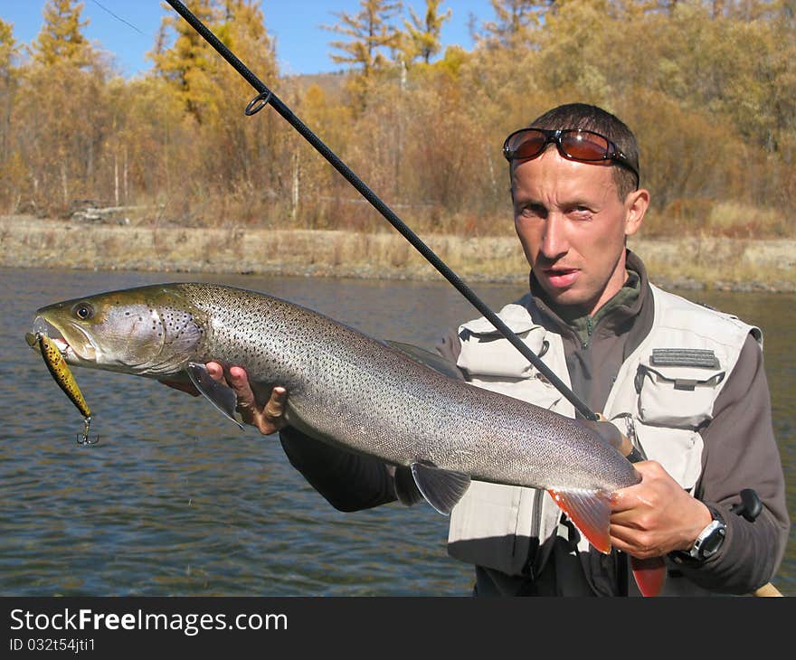 Fishing - fisherman catched big fish