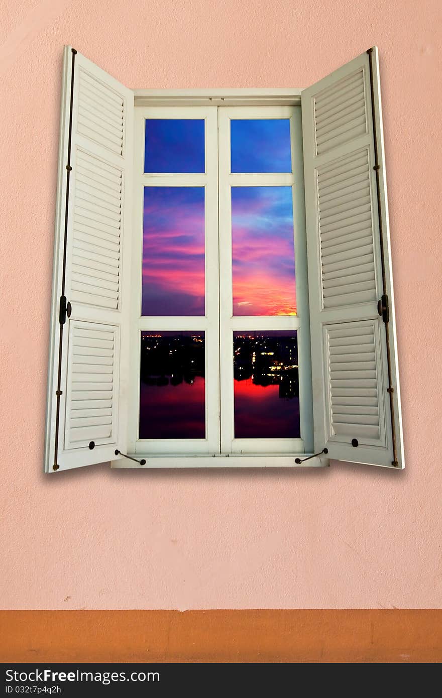 Sunset view from white wooden window on pink wall