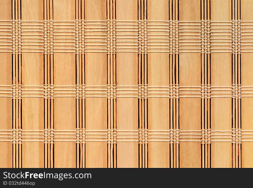 Woven bamboo mat as a simple background. Woven bamboo mat as a simple background