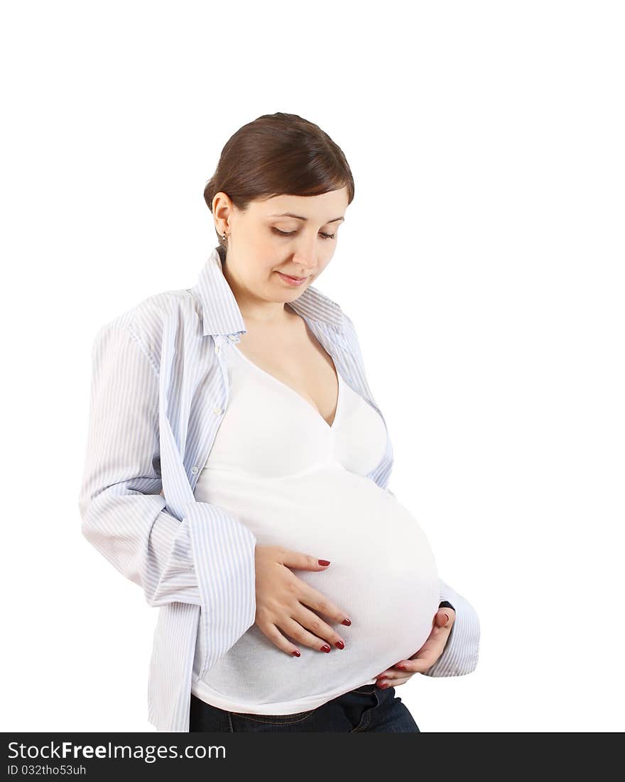 Happy pregnant woman touching her belly