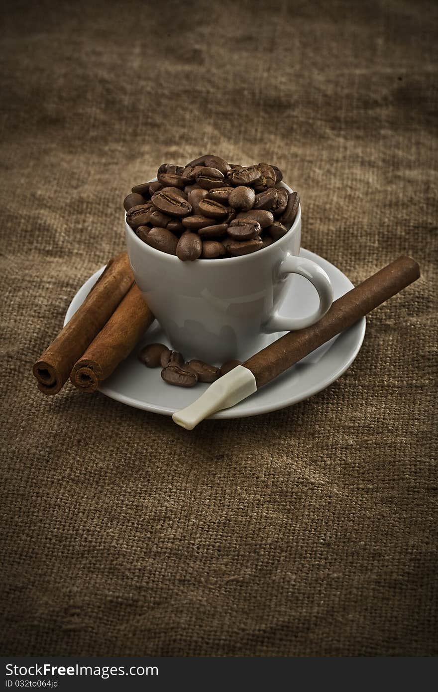 Cup With Beans Cigar And Cinnamon