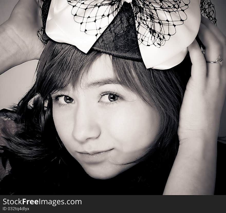 Young beautiful teen girl portrait in a hat with. Young beautiful teen girl portrait in a hat with