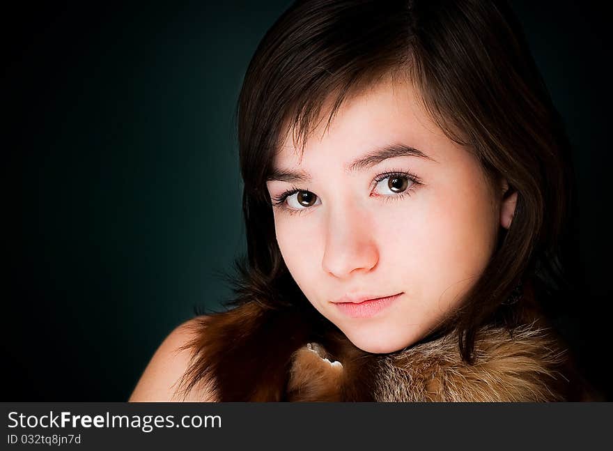 Young beautiful teen girl studio portrait. Young beautiful teen girl studio portrait