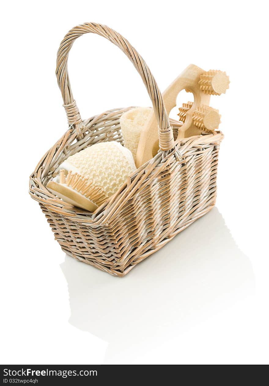 Studio shot objects for care in basket on white background