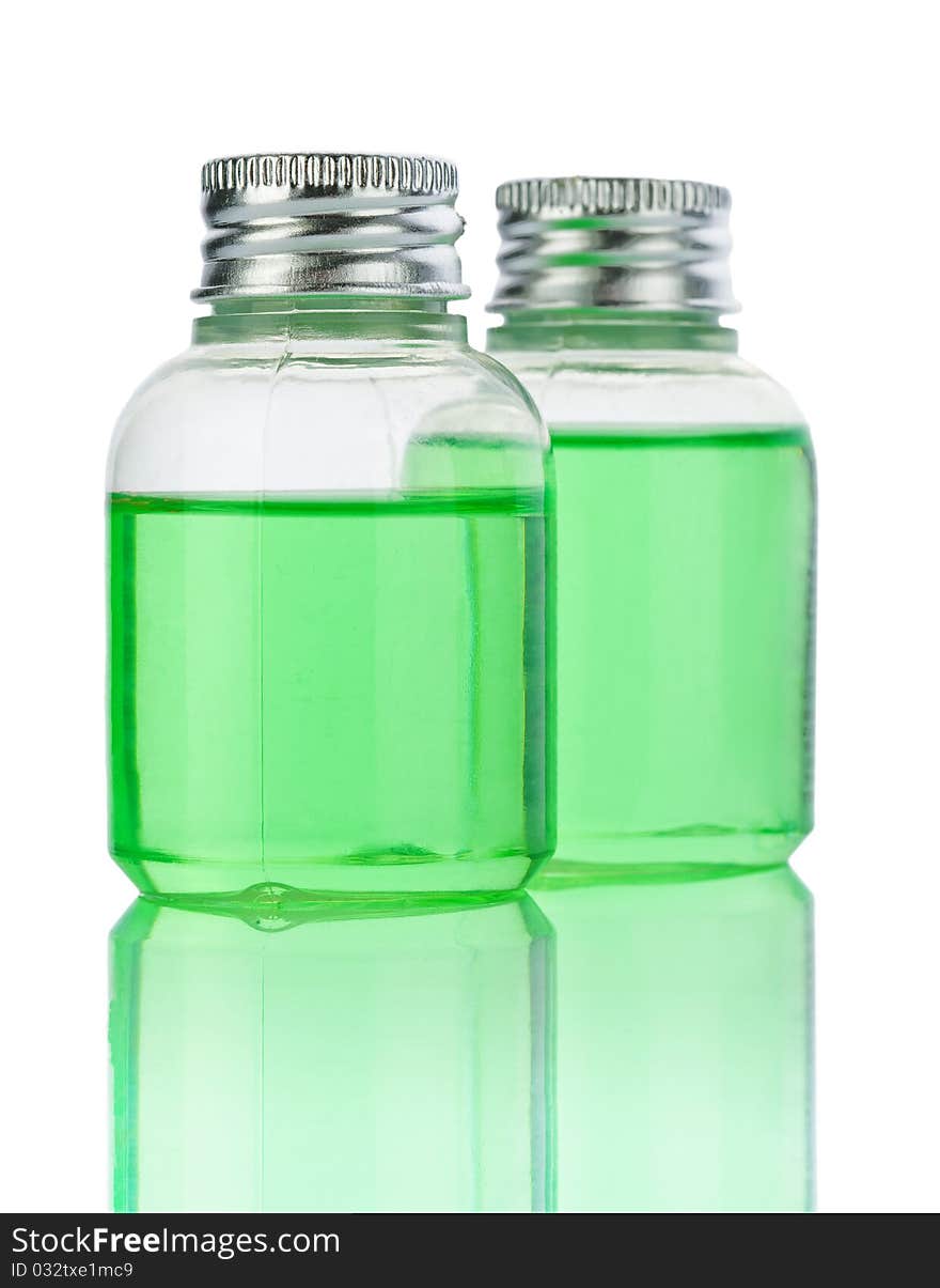 Studio shot plasticals bottle with green liquid