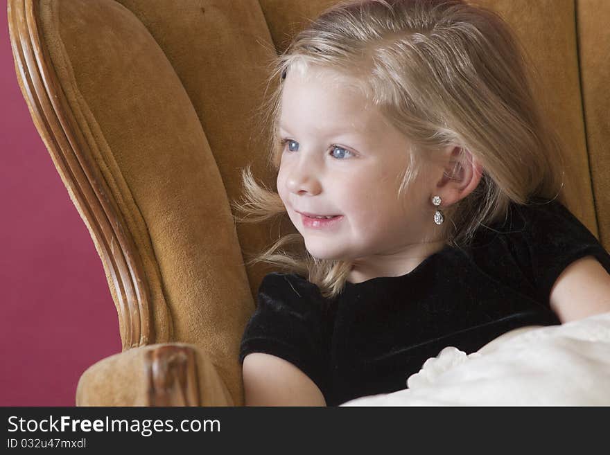 Happy young girl looking away from camera. Happy young girl looking away from camera