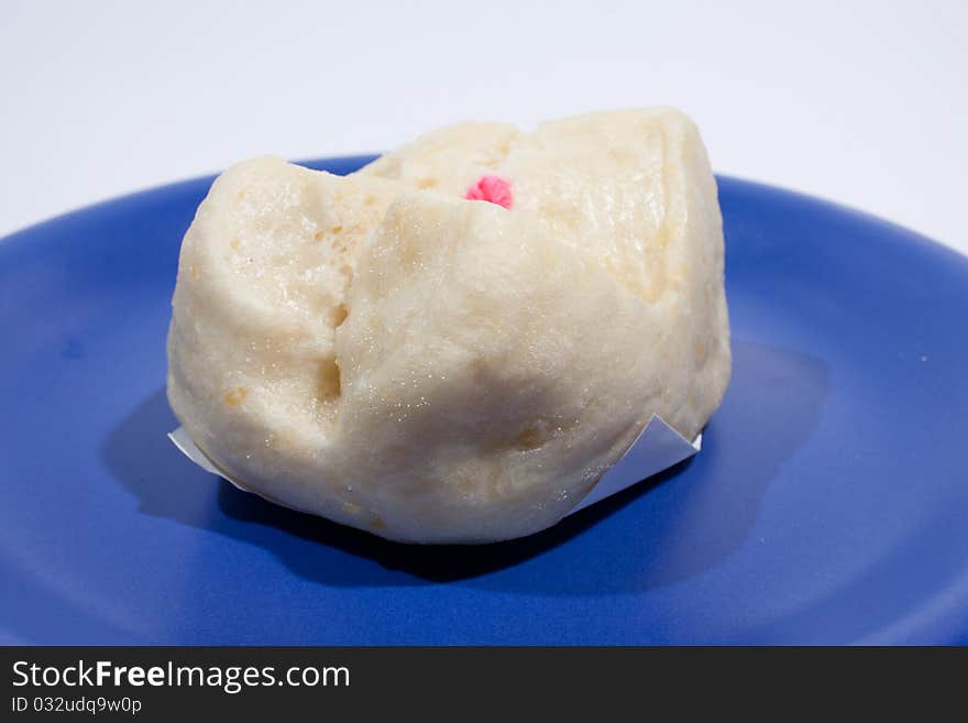 Steamed arranged on a plate on a white background. Steamed arranged on a plate on a white background.