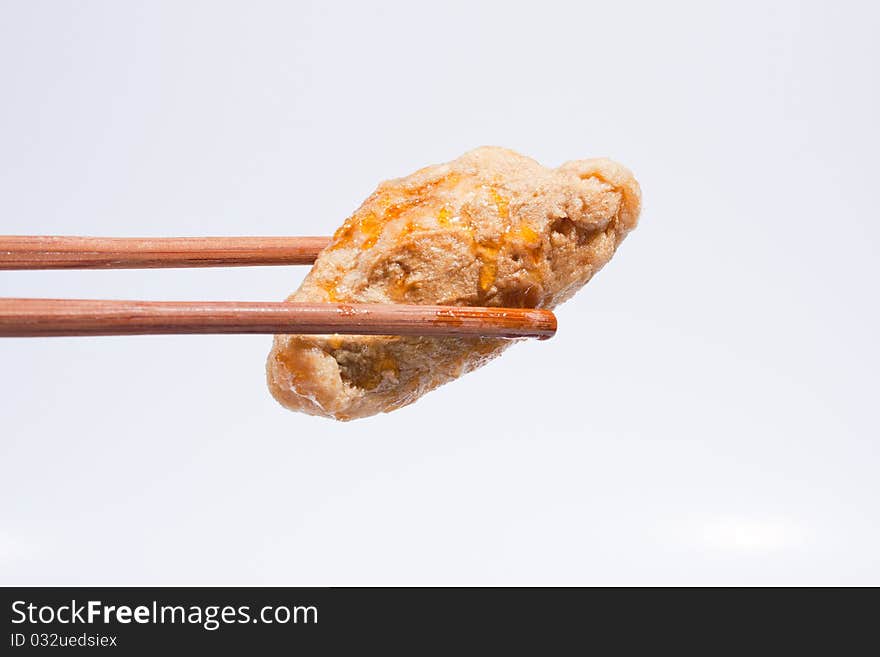 Chopsticks are meatball dish. On a white background. Chopsticks are meatball dish. On a white background.