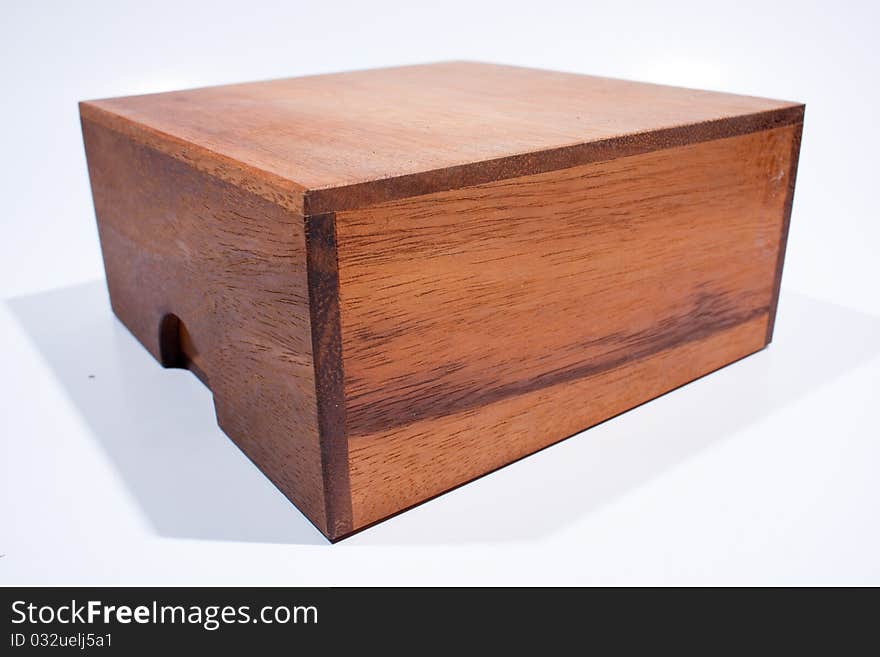 Colored square wooden box. On a white background.