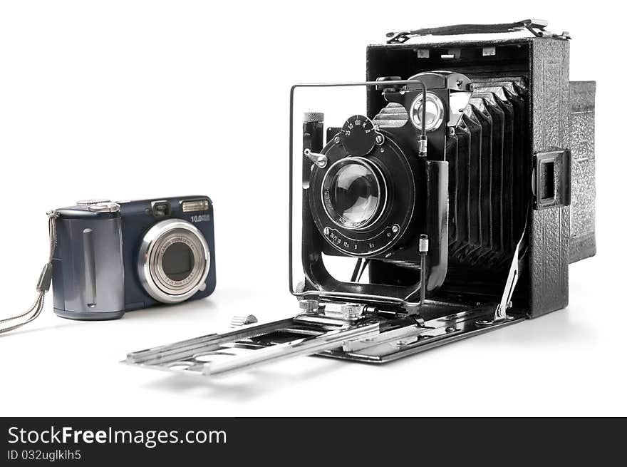 Old and modern camera isolated on white. Old and modern camera isolated on white