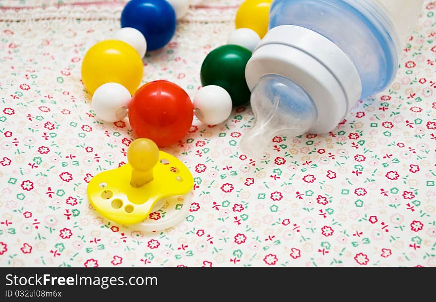 Baby's accessories, on light background