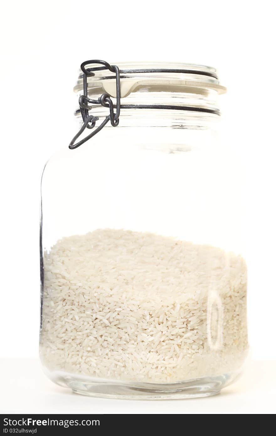 Rice In Jar On White Background