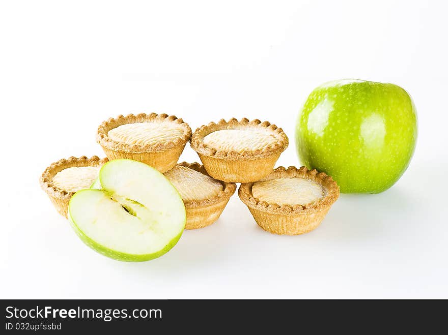 Freshly made apple pies over white background. Freshly made apple pies over white background