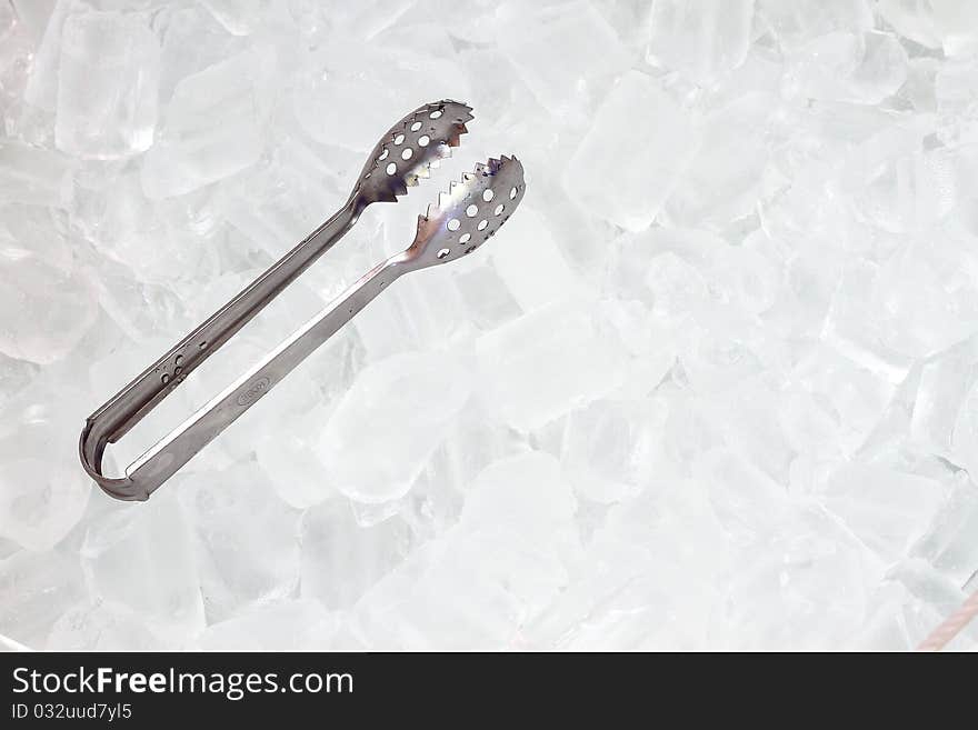 Ice   With Tongs Closeup