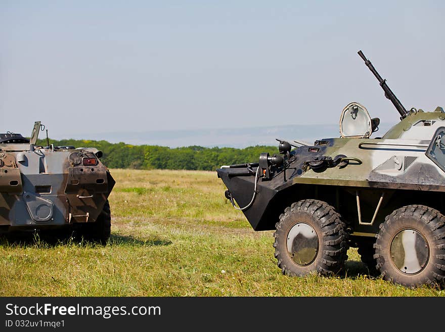 Armoured personnel carriers armed with heavy machine gun. Armoured personnel carriers armed with heavy machine gun.