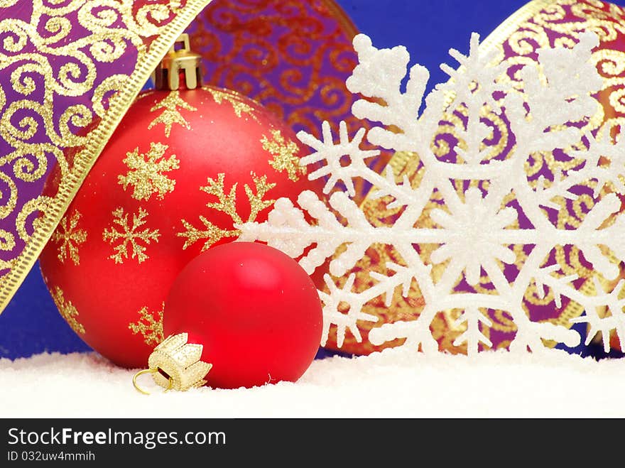 Christmas balls isolated on the blue background