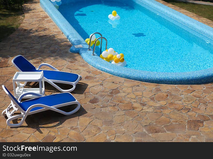 Beautiful pool with blue water and lounge. Beautiful pool with blue water and lounge