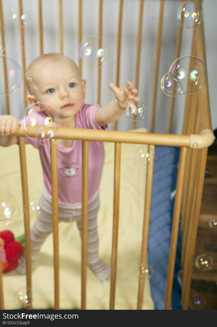 Baby and bubbles.Bubbles in focus, baby out of focus. Baby and bubbles.Bubbles in focus, baby out of focus.