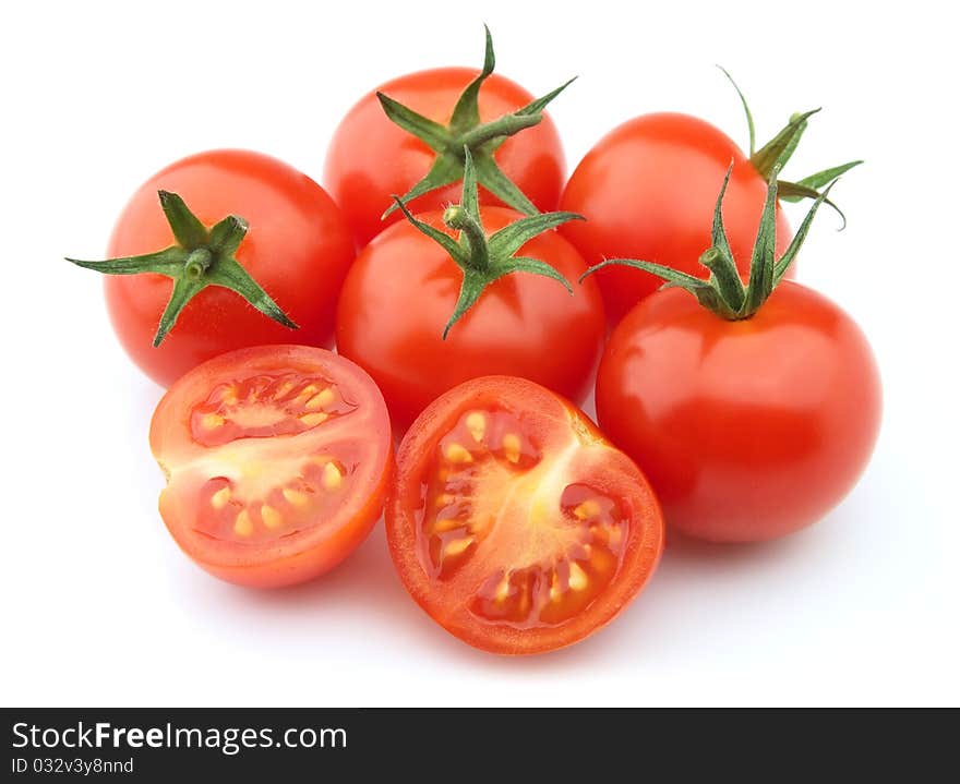 Tomatoes close up on a white background