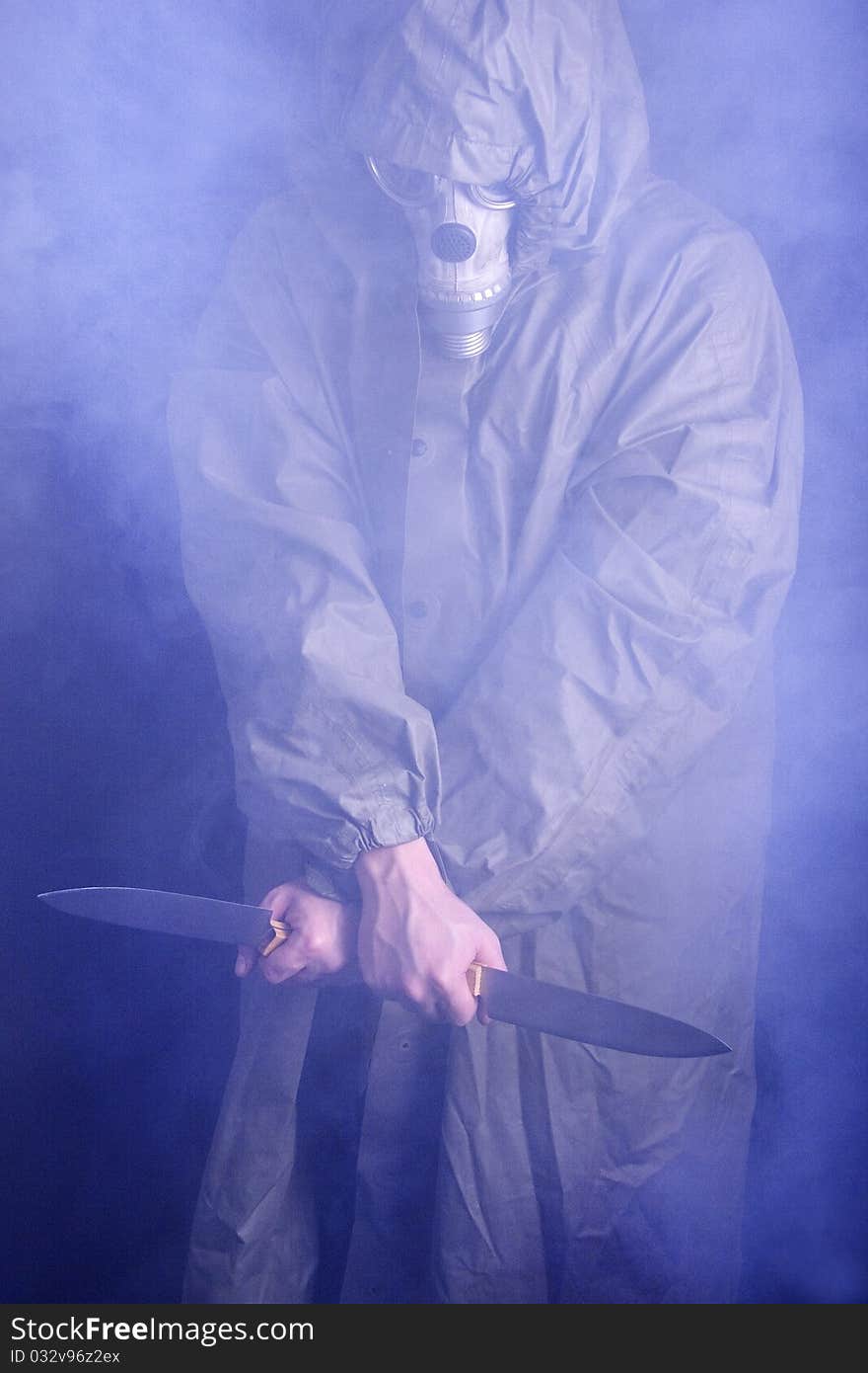 The man in the mask of the knifes