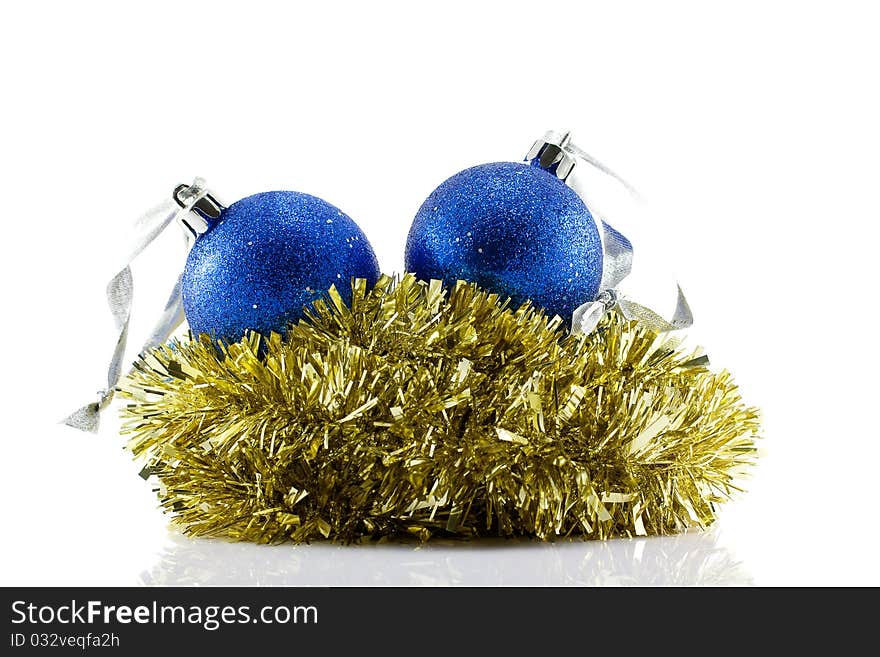 Christmas Balls and gold tinsel isolated on white. Christmas Balls and gold tinsel isolated on white