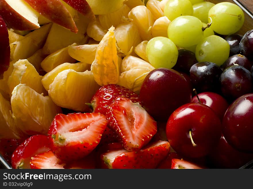 Fresh organic mixed fruitsalad with various fruits. Fresh organic mixed fruitsalad with various fruits