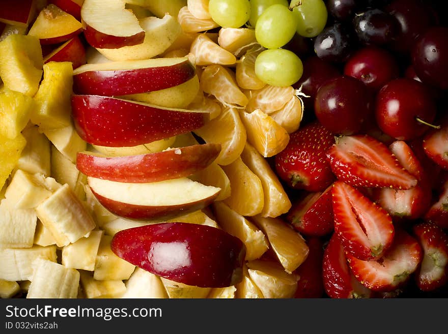 Fresh organic mixed fruitsalad with various fruits. Fresh organic mixed fruitsalad with various fruits