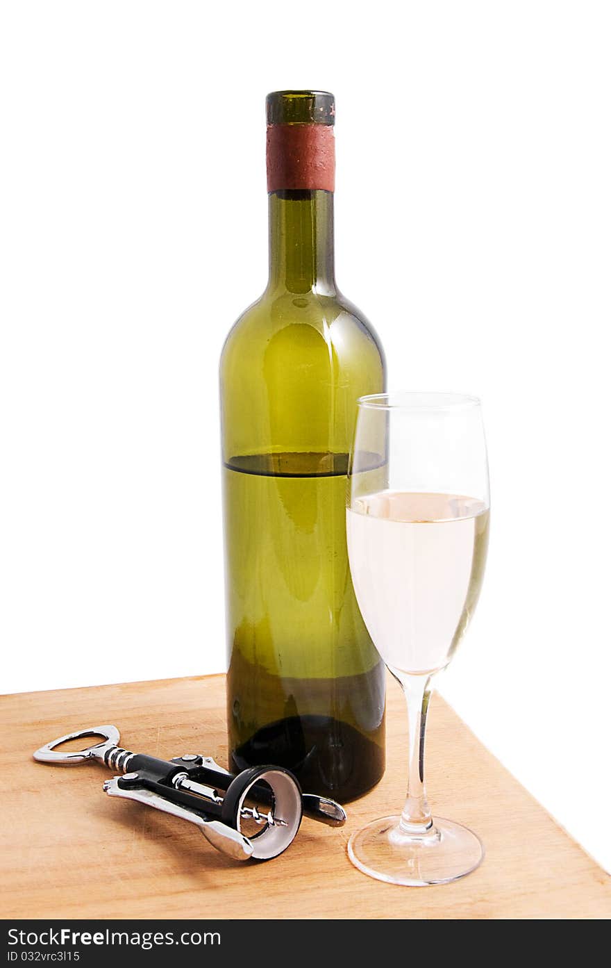 White wine bottle and glass with corkscrew