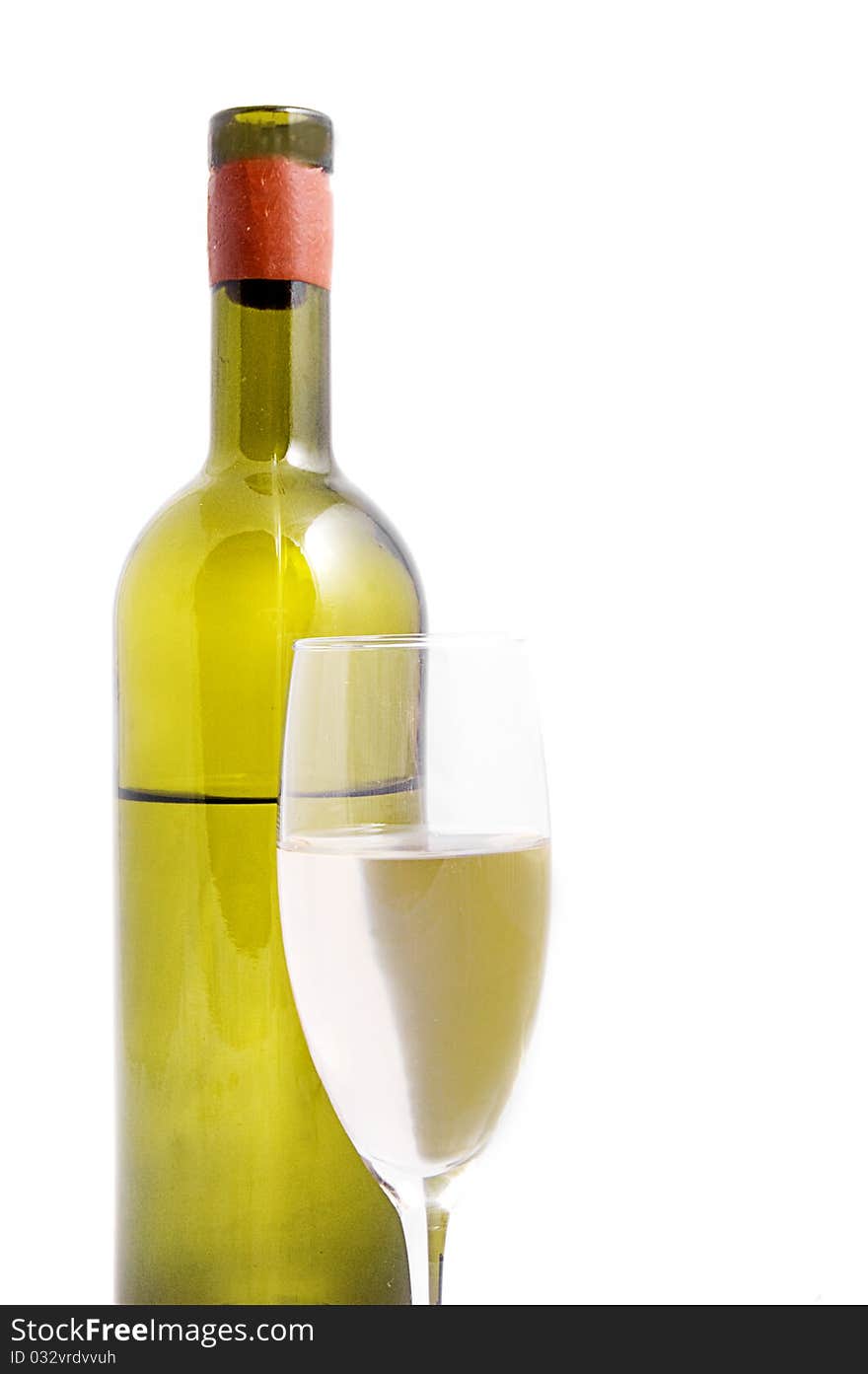 White wine bottle with glass