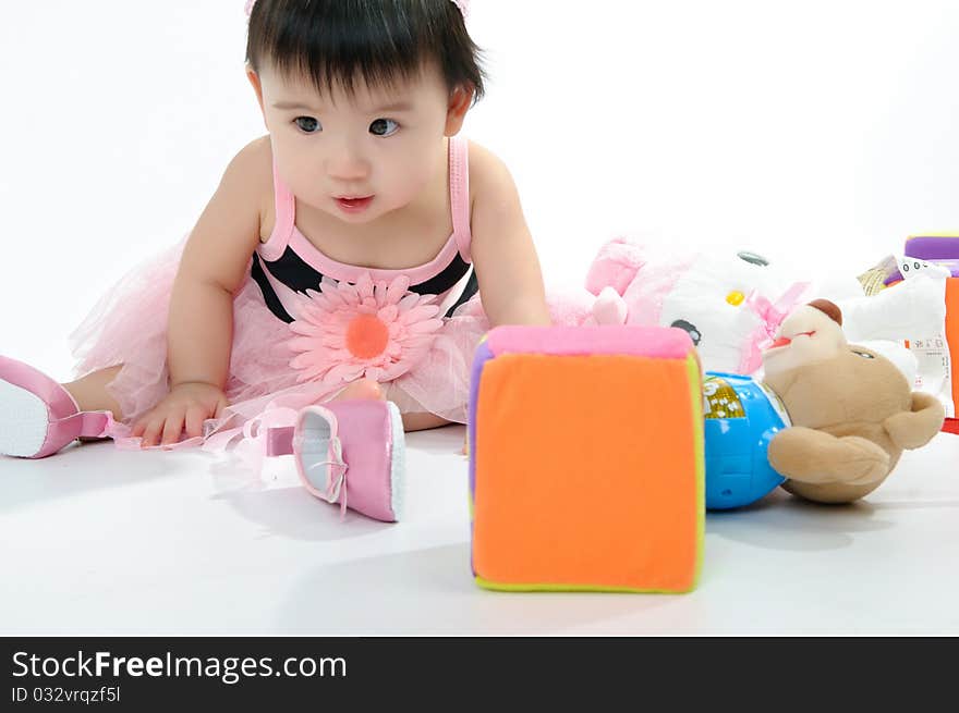 Kid wear in pink dress on floor. Kid wear in pink dress on floor