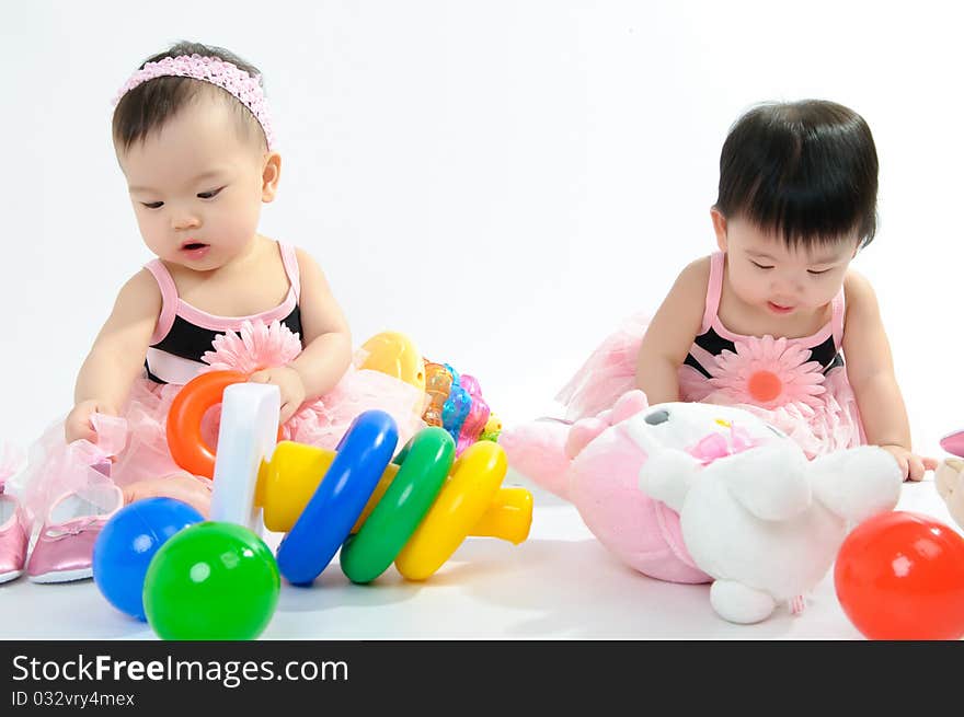 Kid wear in pink dress on floor. Kid wear in pink dress on floor