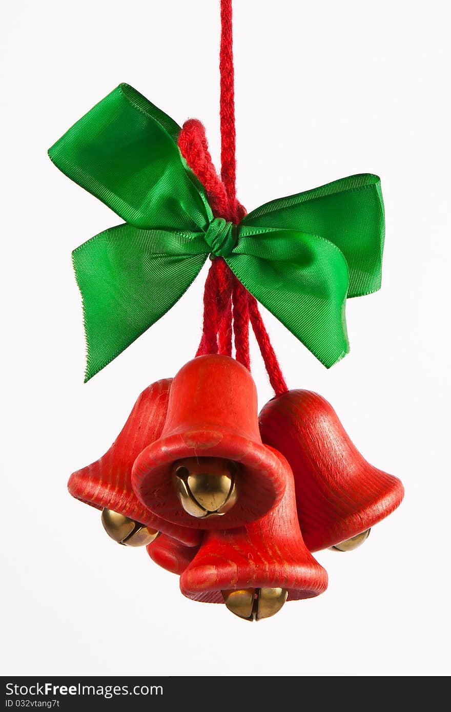 Red jingle bells with a green bow