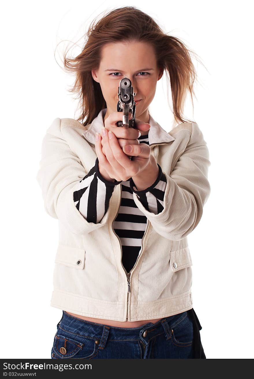 Smiling woman aiming with gun at camera