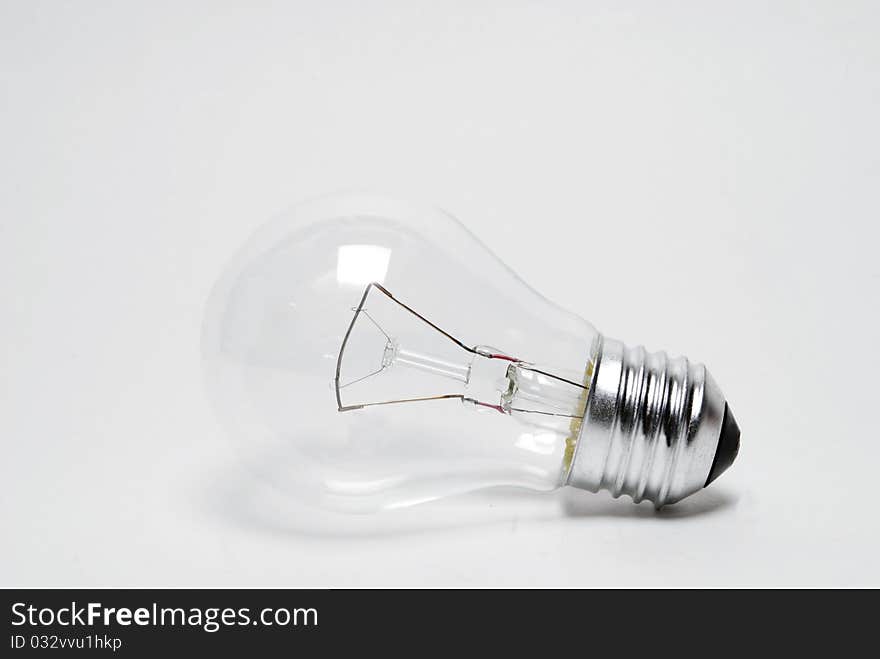 Light bulb on a white background isolated. Light bulb on a white background isolated